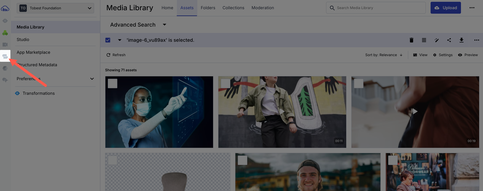 Red arrow pointing at the MediaFlows logo on the Cloudinary console
