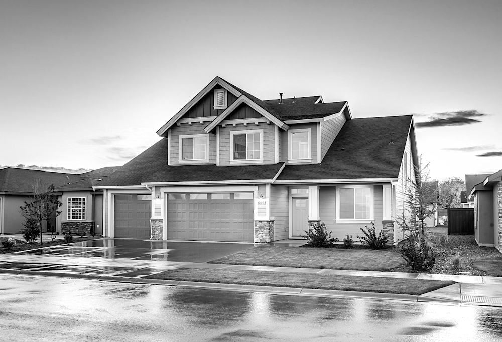 The same image of a house as before, but now entirely greyscale