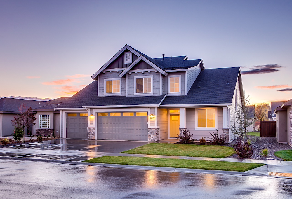 a house on a street after the rain